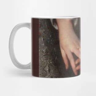 A man and woman's hand. Mug